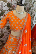 Fancy orange blouse for lehenga