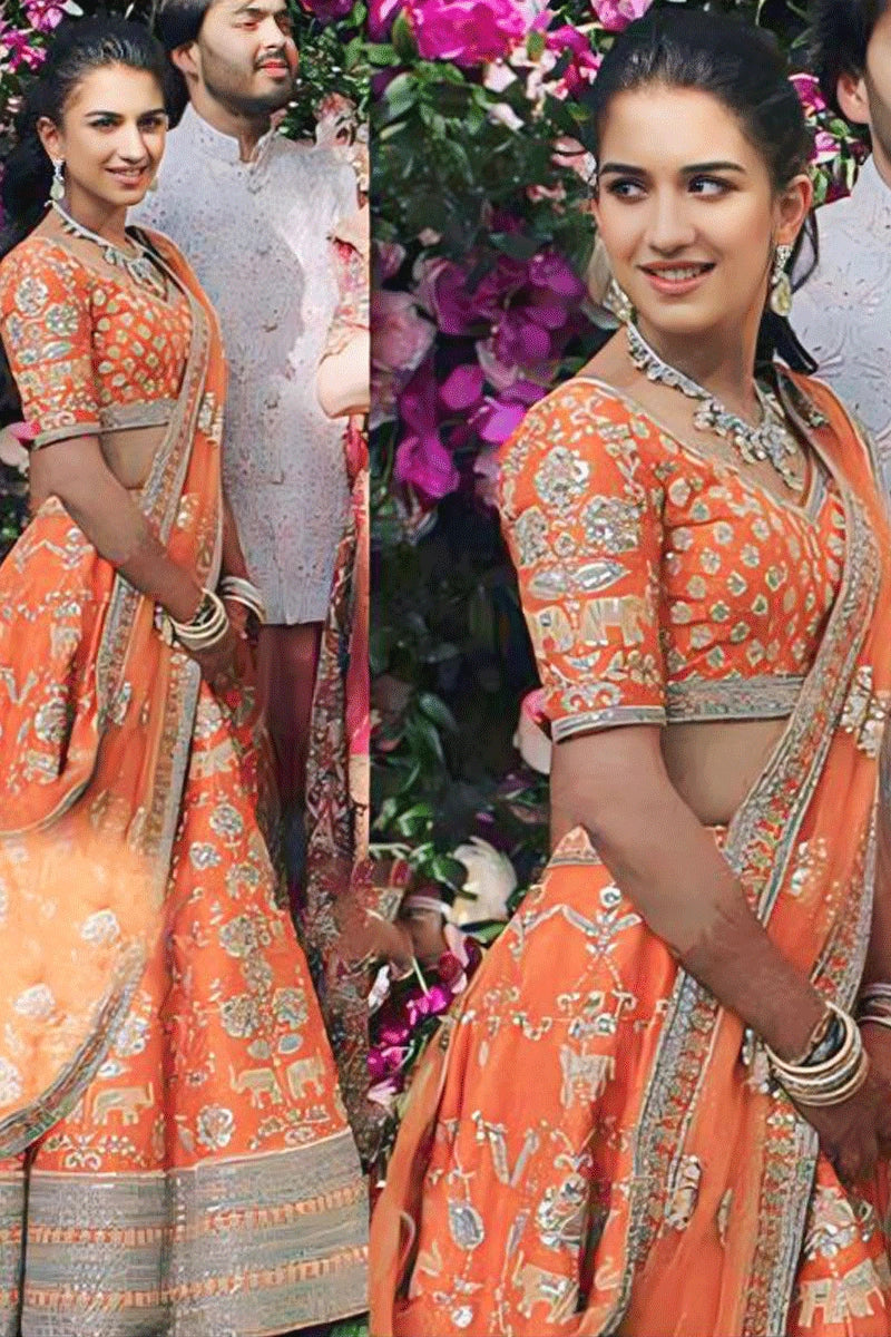 Radhika Merchant orange lehenga