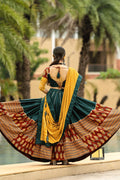 dark green lehenga with fancy blouse with backside design