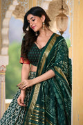 fancy blouse with dark green lehenga choli