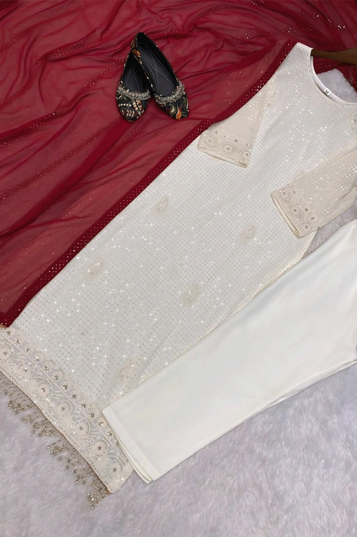 white dress with red dupatta White Anarkali with red bandhej dupatta LUXURY EMPORIUM