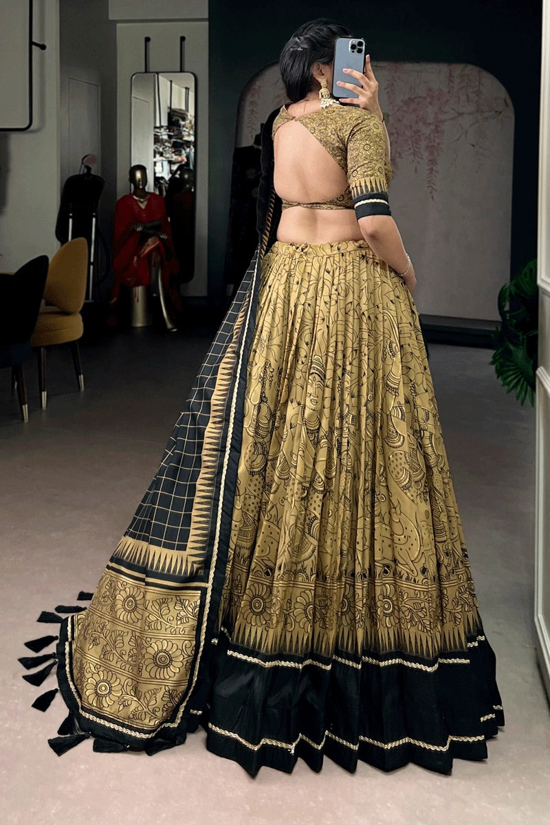 gold color kalamkari print lehenga for wedding function 