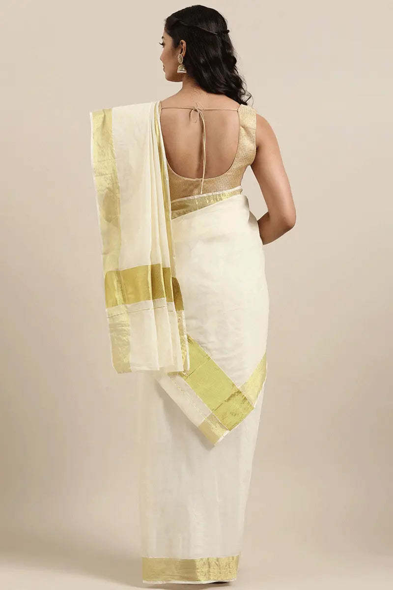 off white and gold saree for onam
