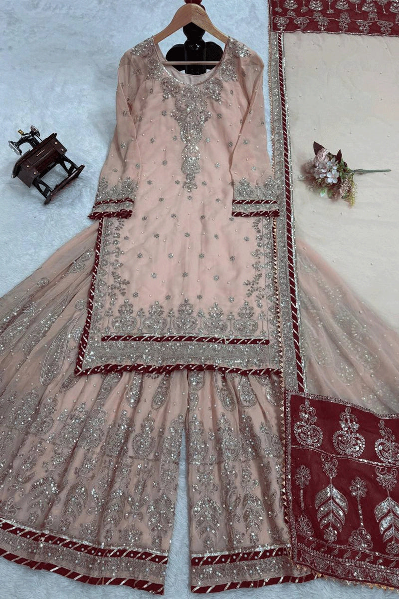 peach colour heavy sharara suit 