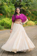 purple blouse with white lehenga