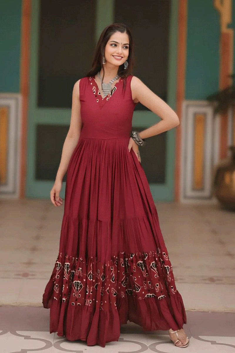 sleeve less maroon gown