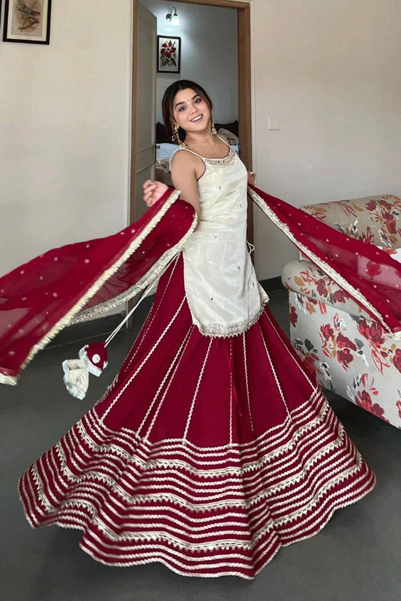 sleeveless mirror work top lehenga
