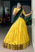 stylish yellow color pattu pavadai half saree