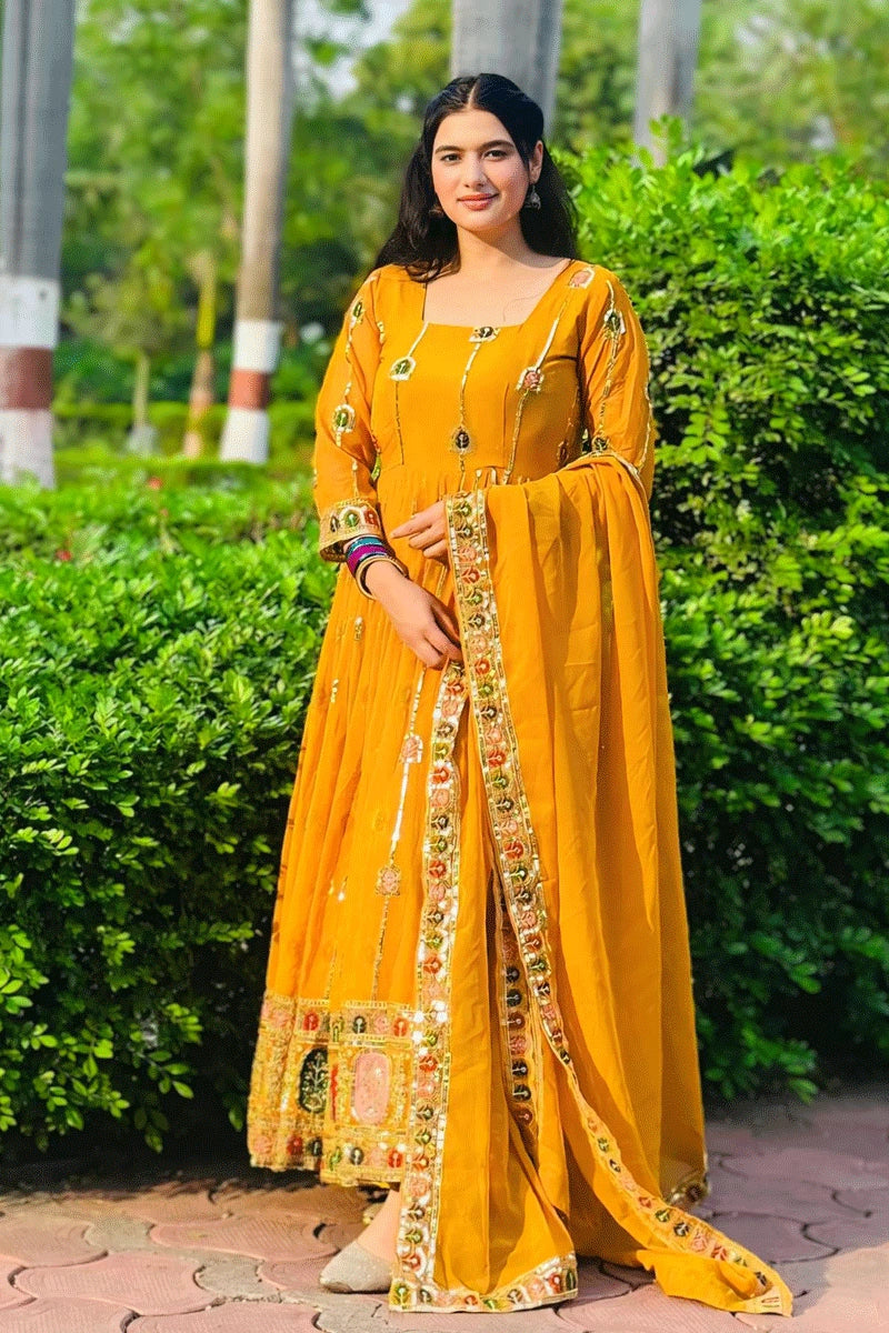 yellow heavy flare gown