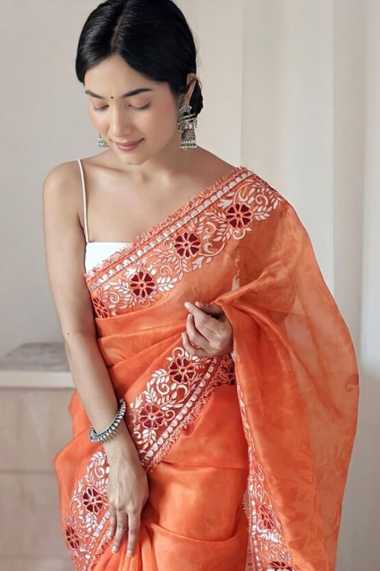 Designer sarees for wedding party online .