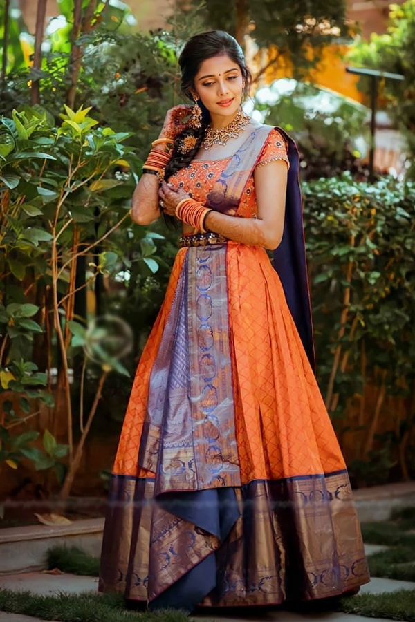All Celebrities Sarees Designs: South Indian Celebrity Madhurima with a  designer banaras and uppada pattu half-saree model saree with mega slevees  designer blouse