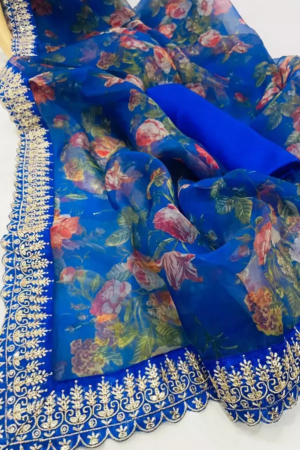 Blue Color Organza Saree With Floral Print Design And Lace Border