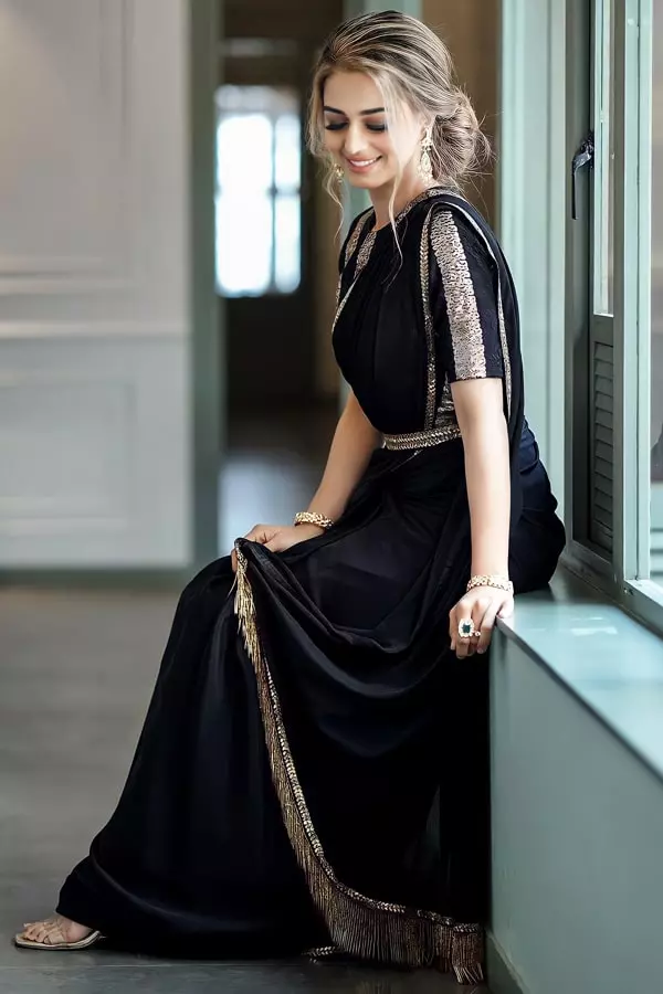black saree with golden border party wear
