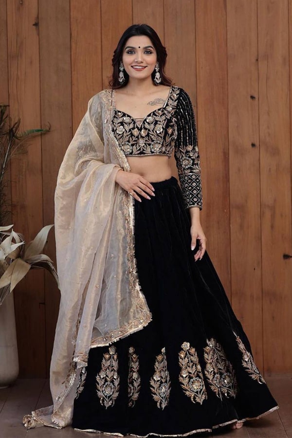 2 Colour Embroidered Attractive Party Wear Velvet Lehenga choli has a  Regular-fit and is Made From High-Grade Fabrics And Yarn.